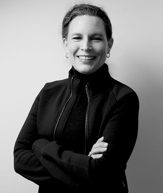 a woman in a black jacket